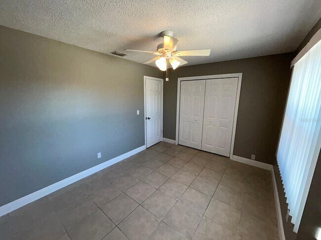 Building Photo - 6525 Manila Palm Way