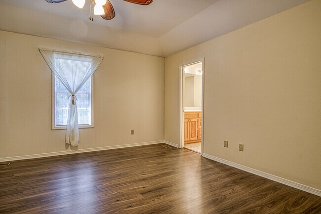 Building Photo - This beautiful home is located in a quiet private neighborhood and perfect for a serene living at...