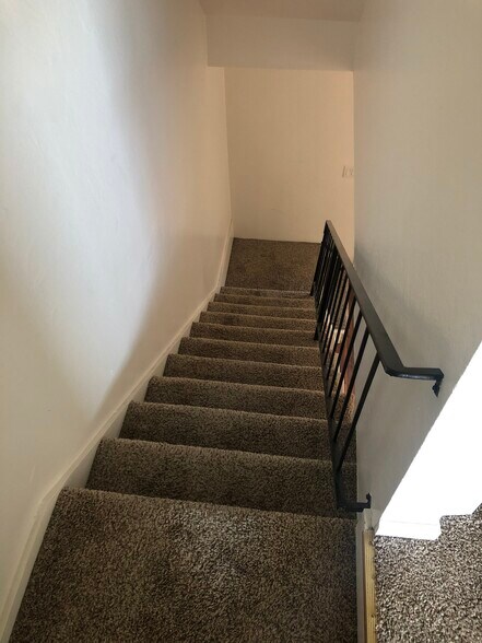Stairs going down to 1st floor - 63 S 9th St