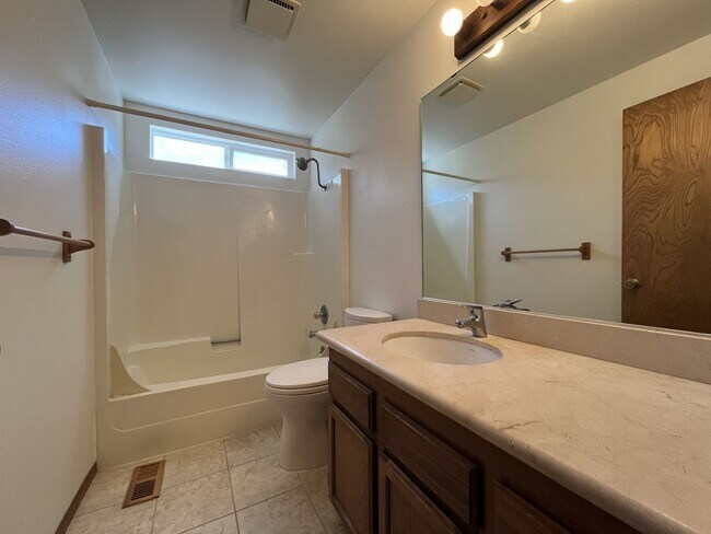 Building Photo - Charming Single-Level Home with Multiple Living Areas and Spacious Backyard Retreat