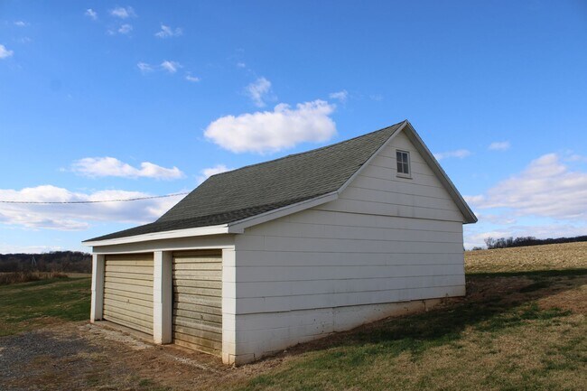 Building Photo - Country Charm in this 2.5 Story Farmhouse