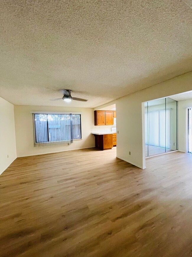 Building Photo - charming 3-bedroom, 2-bathroom home nestle...