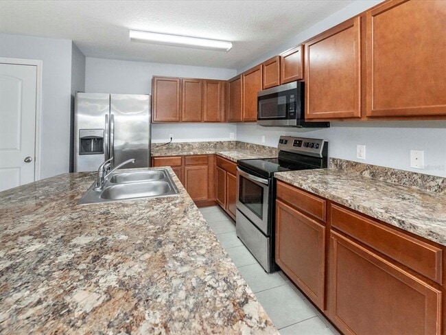 Building Photo - 5555 Maggiore Blvd