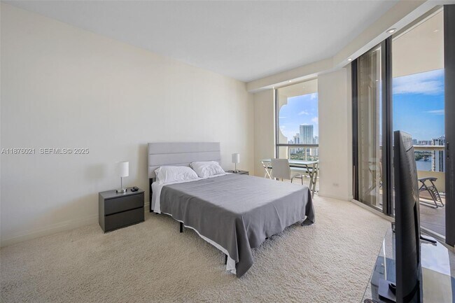 Building Photo - 20191 E Country Club Dr