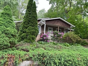 Building Photo - ***FIRST MONTH RENT FREE*** Black Mountain Rentals- Close to Lake Tomahawk and Black Mountain Gol...