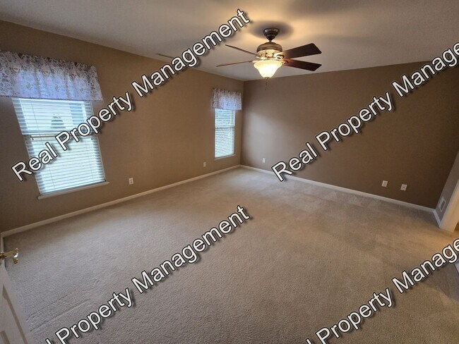 Building Photo - Maintenance Free Two Bedroom Townhome