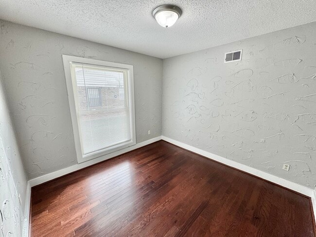 Building Photo - 6184 Holly Park Dr