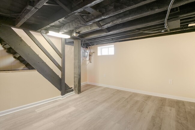Building Photo - Spacious 2BR/2.5BA Townhome with Finished Basement & Extra Storage