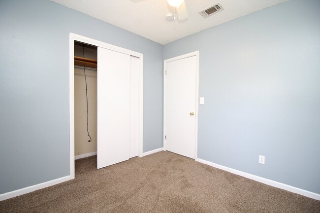 Building Photo - Spacious 3BR/1.5BA Home in Pace with Open Living Area, Tiled Family Room, and Fenced Backyard – M...