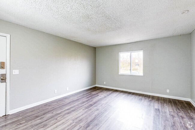1BA, 1BR - 700SF - Living Room - Pike Place Apartments