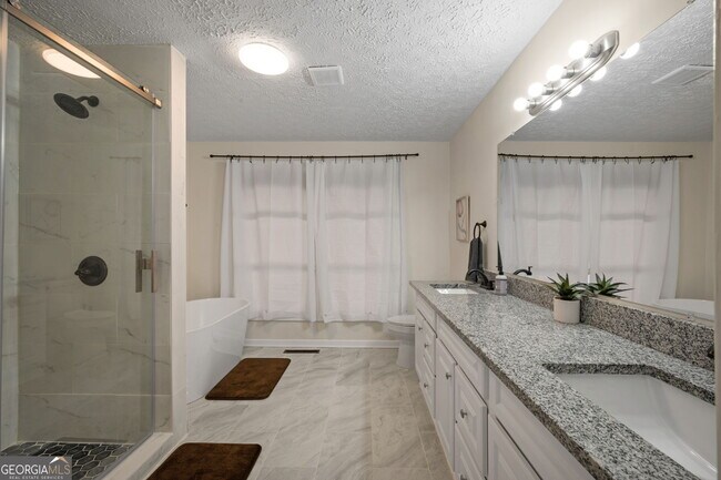 Building Photo - 1954 Woodbine Terrace NE