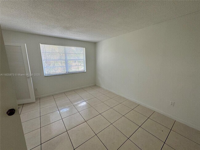 Building Photo - 4440 NW 79th Ave