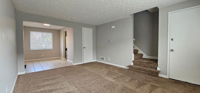 Building Photo - Cozy 2 bed 1 bath  townhouse with attached...