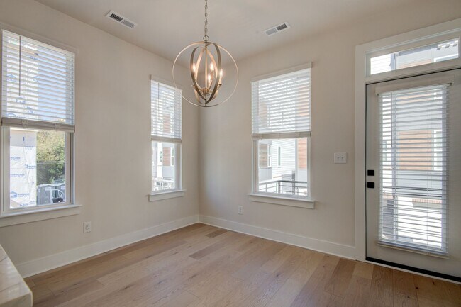 Building Photo - COMING SOON! Modern End-Unit Living Near Uptown | Rooftop Terrace + Tandem Garage