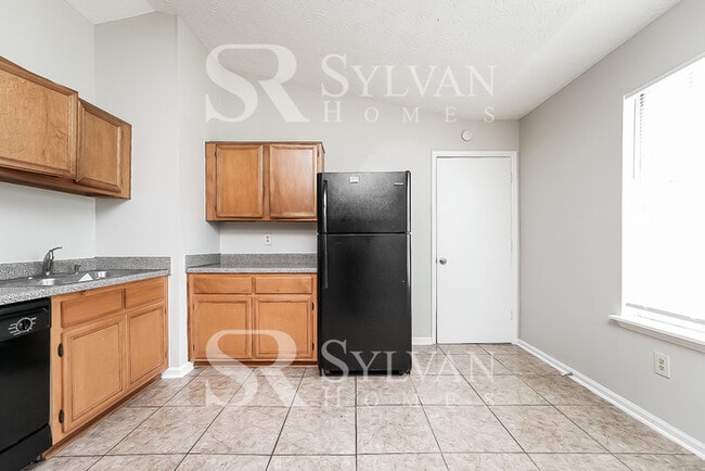 Building Photo - Lease today! No extra charge for contentme...