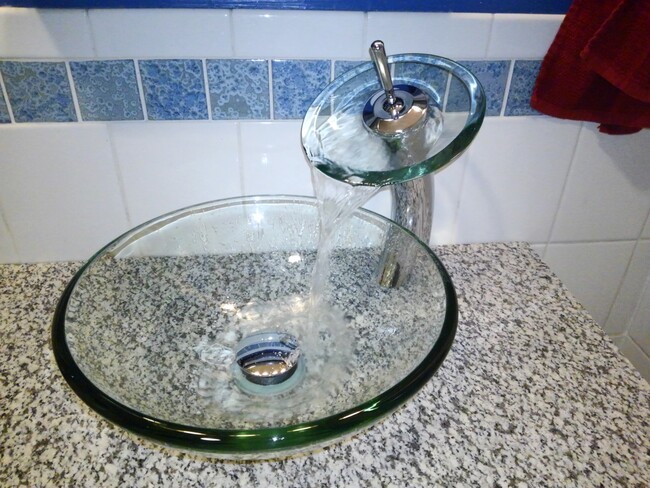 Waterfall Faucet & Glass vessel sink - 220 Ontario St