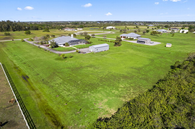Building Photo - 8135 White Fences Ln