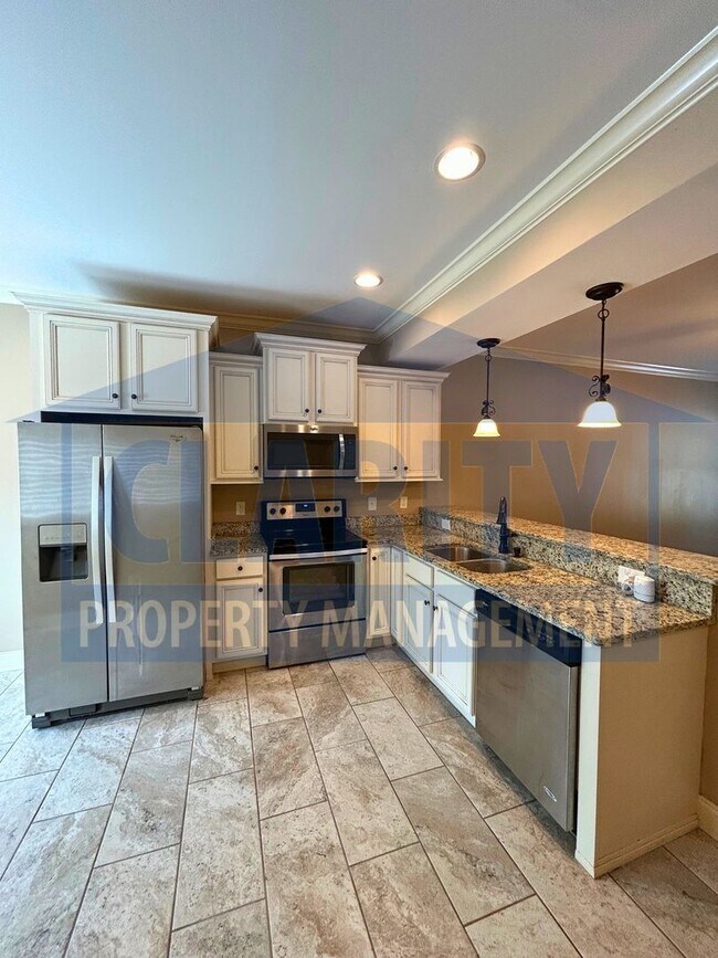 Building Photo - Modern 2-bedroom, 2.5-bath townhome
