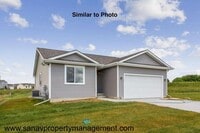 Building Photo - Charming Hoover Ranch in Bondurant – Move-In Ready for July!