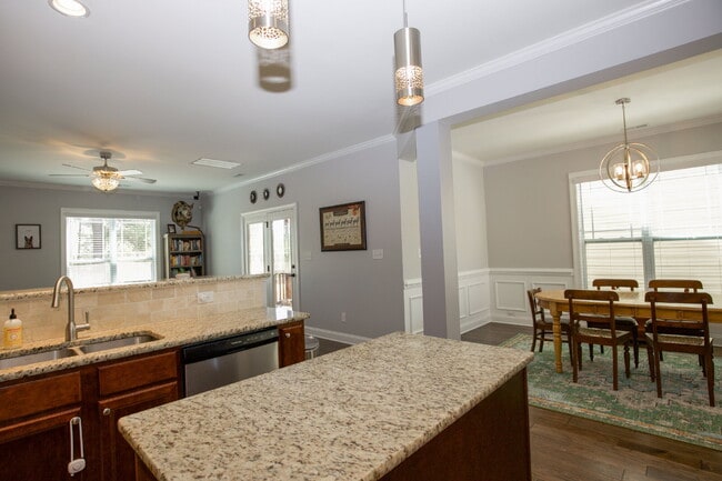 Building Photo - "Spacious 4-Bedroom, 2.5 Bath Gem with Law...