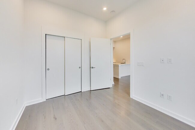 Building Photo - Top floor residence in elevator building with sweeping views.
