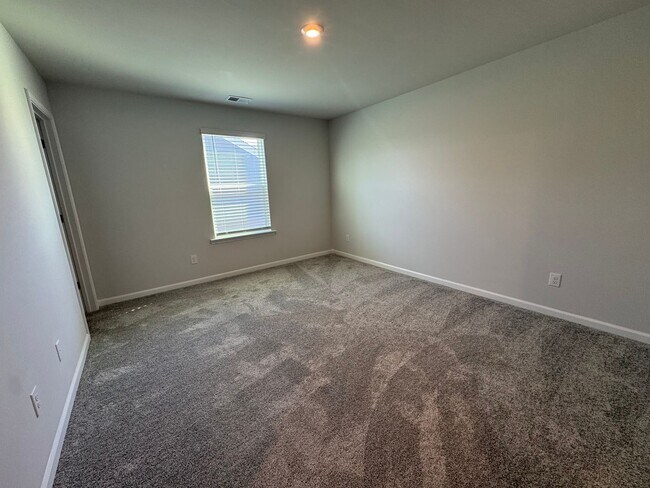 Building Photo - Spacious 1.5-Story 4BR Home with Bonus Room in Active 55+ Community