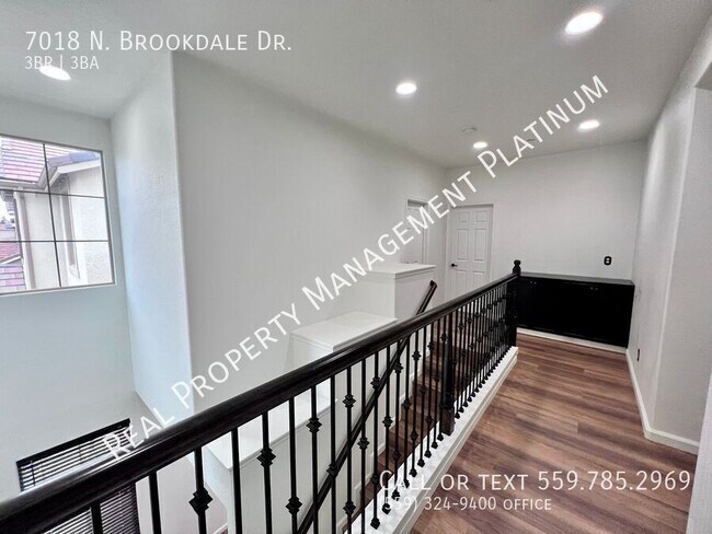 Building Photo - 7018 N Brookdale Dr