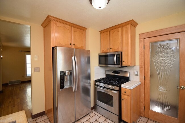Building Photo - Amazing Home in Millcreek with Backyard Oasis!