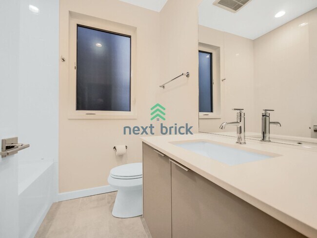 Building Photo - Stunning 2023-Built Crown Hill Townhome | 3 Bed | 2 Bath | Modern Finishes & Prime Seattle Location
