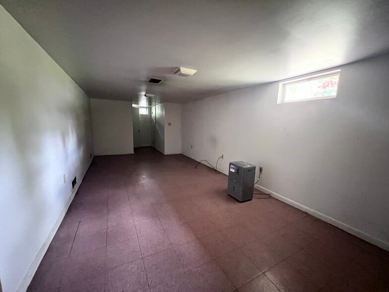 Lighted basement with window - 18 Ridgecrest Ave