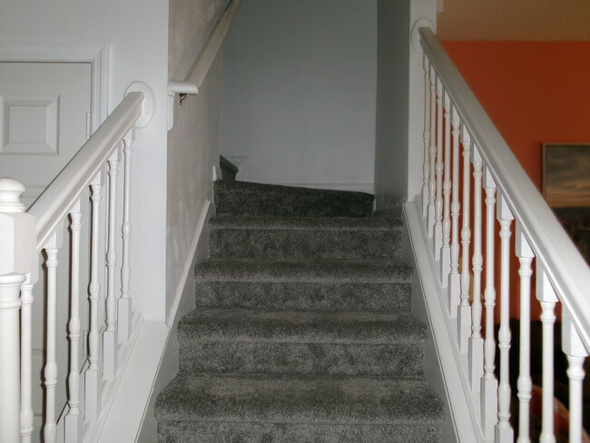 Stairs to second floor - 1285 South Beach Cir