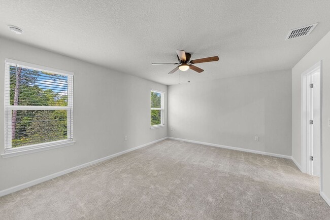Building Photo - Brand-New 4BR Home with Tile Floors & Quartz Kitchen & Conservation Views