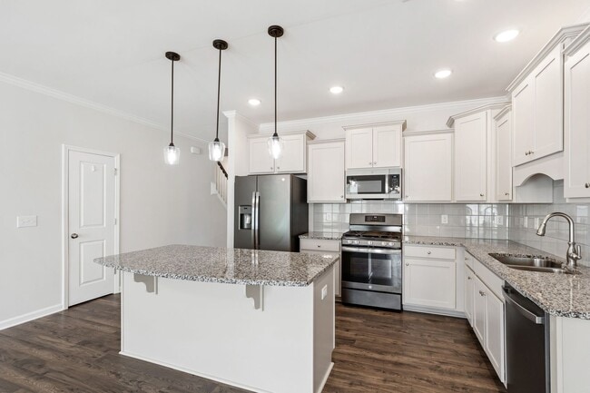 Building Photo - Stylish 4-Bedroom Townhome with Backyard O...