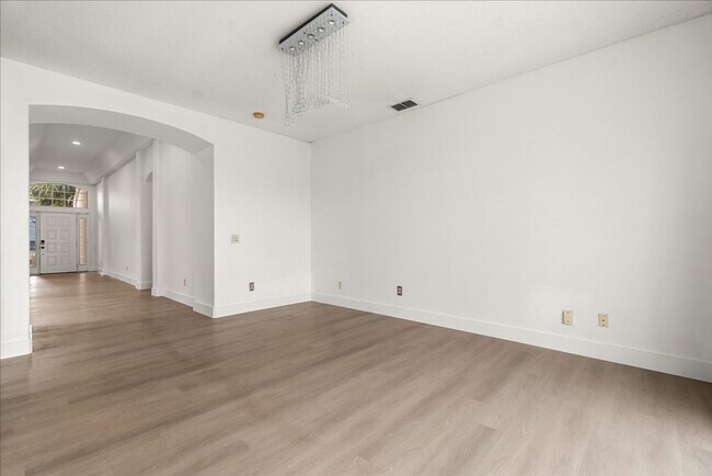 Building Photo - Stunning 4-Bedroom Lakefront Pool Home in Bridgeview at Meadow Woods