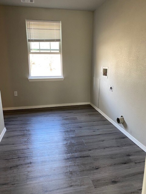 laundry in hallway - 430 W. 7th St