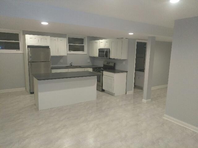 Building Photo - 6042 S Kolmar Ave