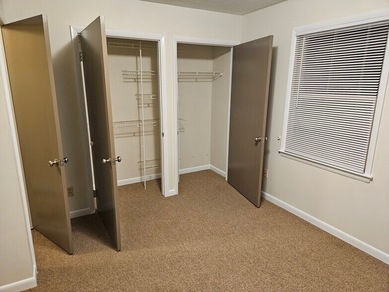 Bedroom 2 with double closets - 1730 College Ave