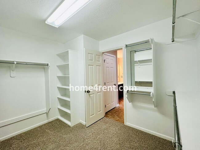 Building Photo - Wood Floors, Open Layout, Plenty of Natura...