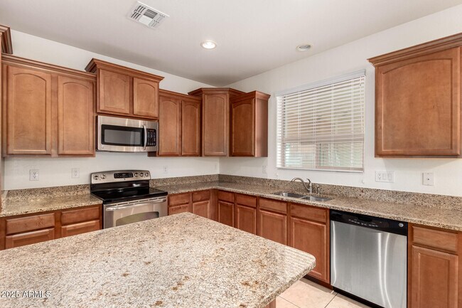 Building Photo - 9883 W Harmony Ln