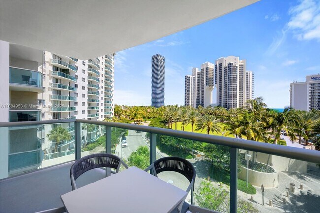 Building Photo - 19370 Collins Ave