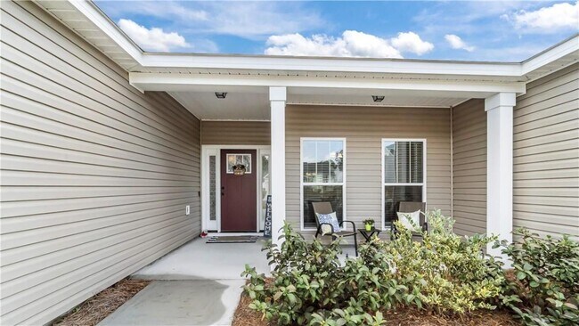 Building Photo - Relax & Unwind at this 4-Bedroom Home with Scenic Lagoon Views in Rincon