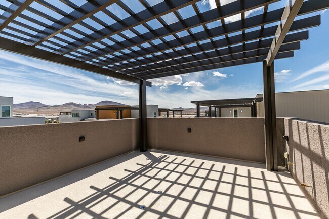 Building Photo - Stunning 4-Level Townhome in Inspirada | R...