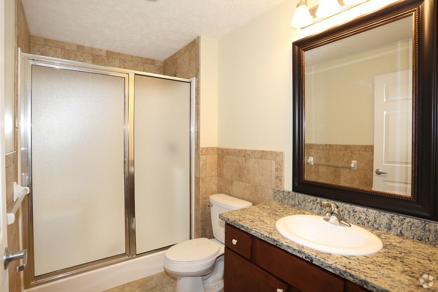 Bathroom Complete with Walk-In Shower - Tocco Villaggio Apartments