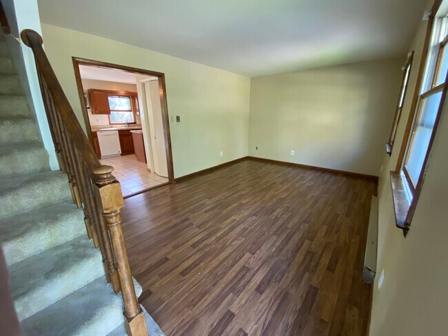 living room, stairs, and kitchen from stairs - 1518 Howell Rd