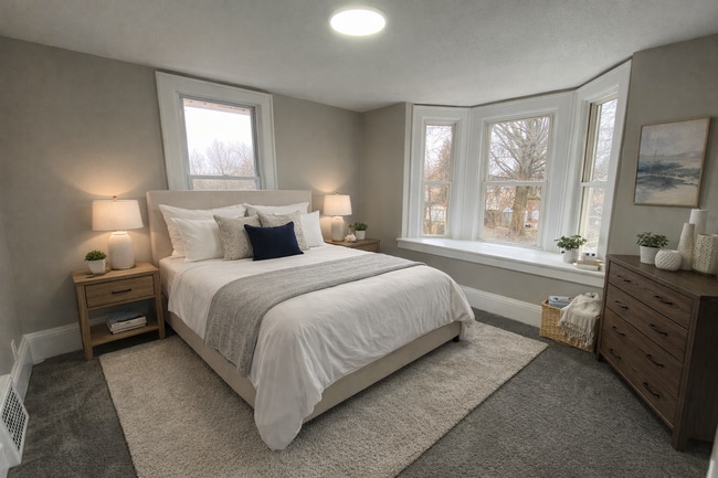 Building Photo - More Space Than You’d Expect: Updated 3BR w/ 1.5 Baths + Carpeted Attic Bonus