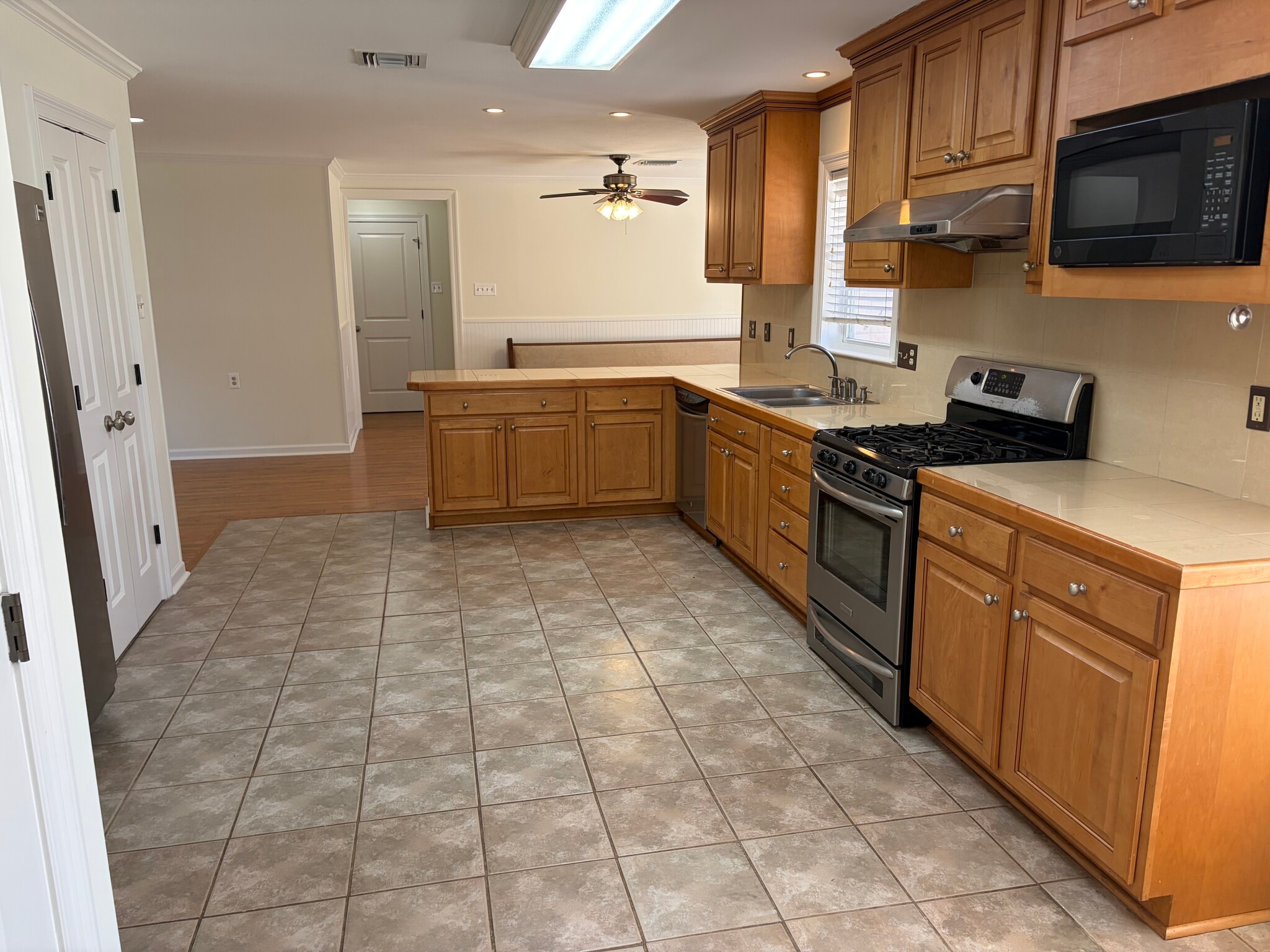Kitchen to dining area - 6034 Chamberlain Dr