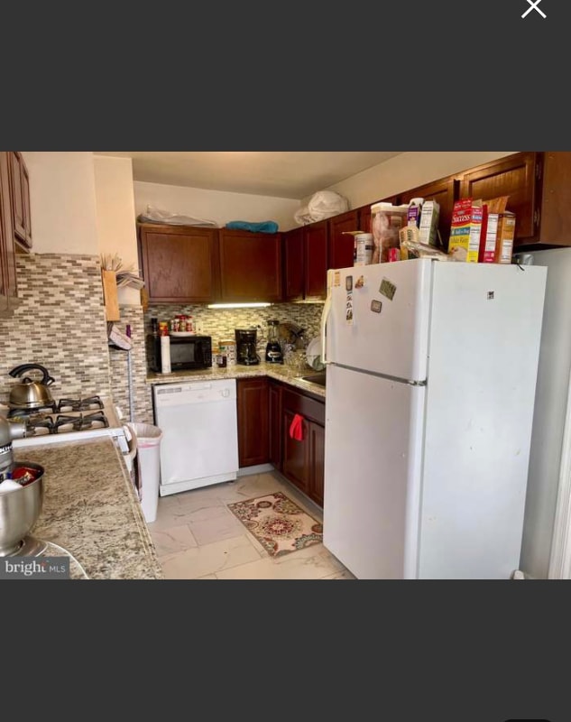 Building Photo - 5851 Quantrell Ave