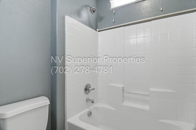 Building Photo - NW!! 4 Bedrooms!!! One Bedroom Down!!  Pool!!! Tankless Hot Water Heater!! Court yard at entrance...