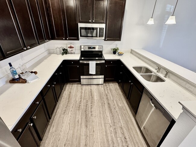 Building Photo - Available NOW! 1st Time Rental! Water, Sewer Trash, Landscaping, Community Pool Included!