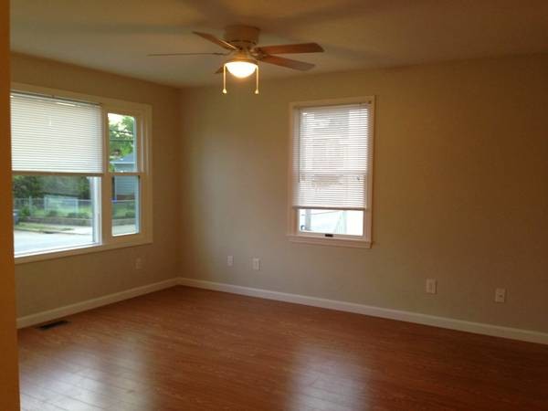 Large bright living room with hardwoods - 539 Admiral St